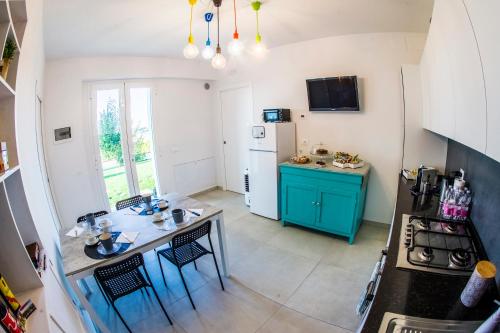 Kuchyň nebo kuchyňský kout v ubytování B&B Al Chicco d'Uva