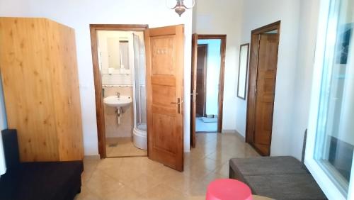 a bathroom with a toilet and a sink at Pirovac - most beautiful beaches in Dalmatia in Pirovac