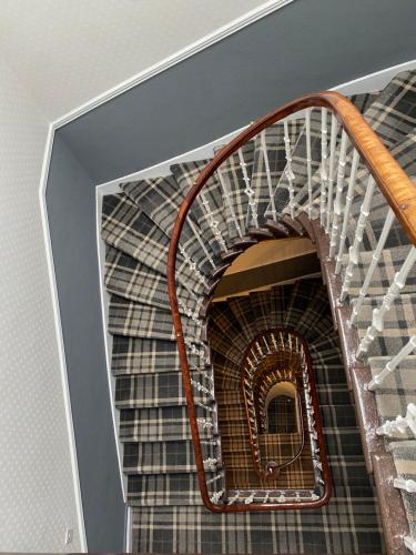 a spiral staircase in a building at Park View House in Edinburgh