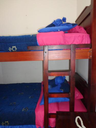 Двуетажно легло или двуетажни легла в стая в ESCOCIE- PLAZA GRANDe
