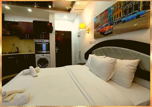 Katil atau katil-katil dalam bilik di Assaraya Palace Hotel