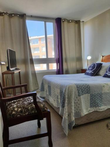 Säng eller sängar i ett rum på Aparthotel Serena