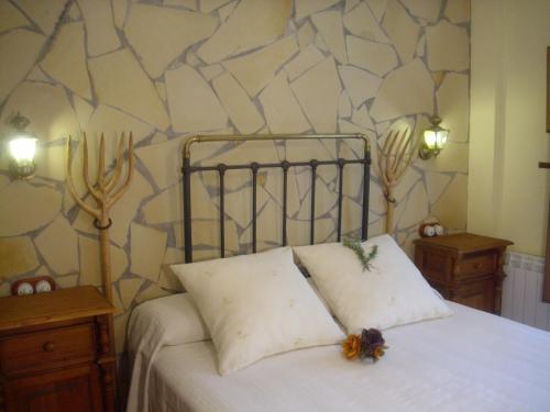 Voodi või voodid majutusasutuse Casa Carabias toas