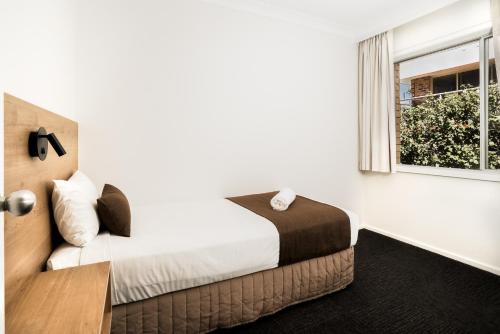 Postel nebo postele na pokoji v ubytování Caribbean Motel