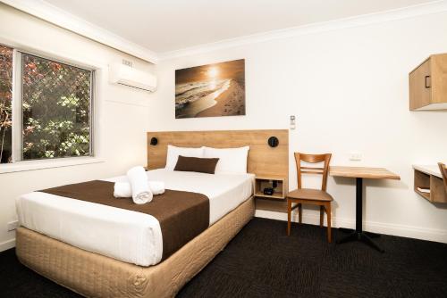 Postel nebo postele na pokoji v ubytování Caribbean Motel