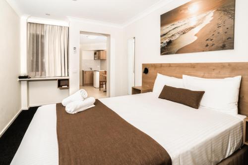 Postel nebo postele na pokoji v ubytování Caribbean Motel