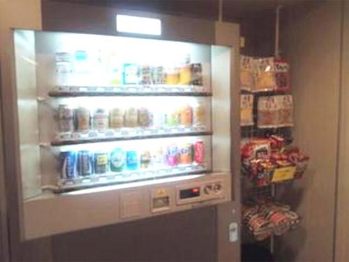 a vending machine filled with lots of drinks and food at City Inn Nishi Tanabe in Osaka