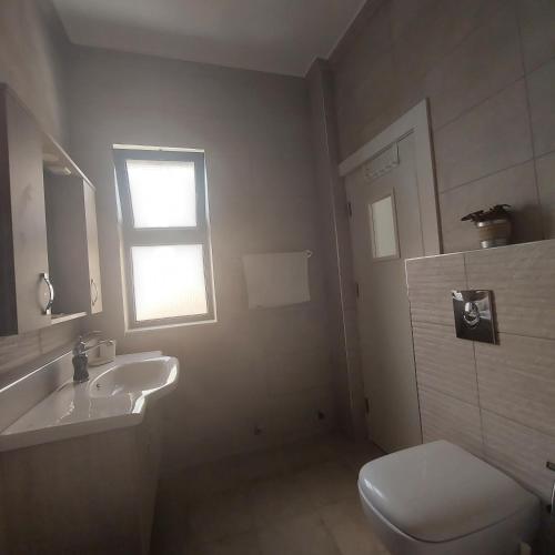 Koupelna v ubytování COCO Guesthouse