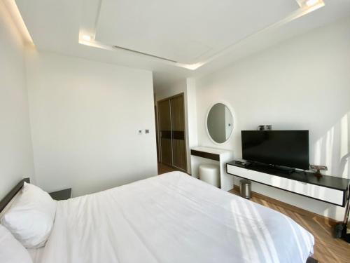 TV o dispositivi per l'intrattenimento presso Vinhomes Metropolis Hanoi Apartment Hotel