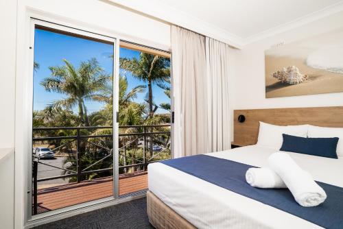 Postel nebo postele na pokoji v ubytování Caribbean Motel