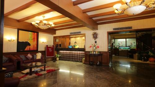 The lobby or reception area at Nahar Heritage Hotel
