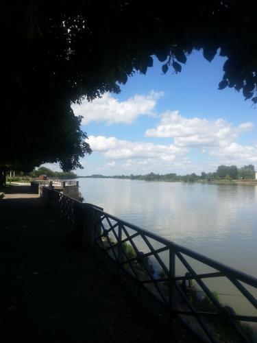 a view of a body of water with a fence at Best Western Plus d'Europe et d'Angleterre in Mâcon