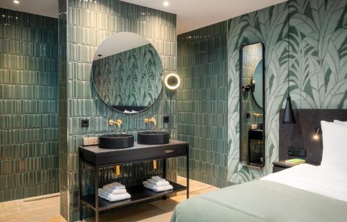Postel nebo postele na pokoji v ubytování Van der Valk Hotel Hildesheim