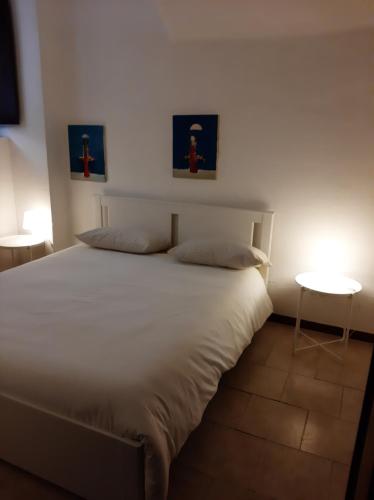 Кровать или кровати в номере Appartamento A.D.