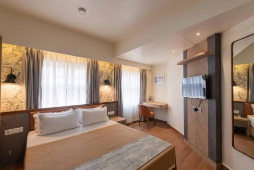 Кровать или кровати в номере HOTEL ROI-KI
