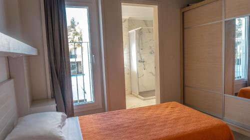Postel nebo postele na pokoji v ubytování Muskebi Apart Otel