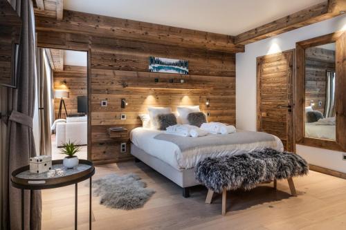 Ένα ή περισσότερα κρεβάτια σε δωμάτιο στο Alaska Lodge by Alpine Resorts