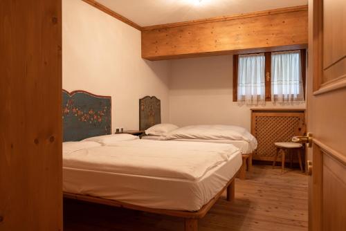 Cama ou camas em um quarto em Casa Belvedere 1