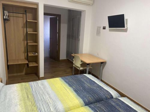 TV a/nebo společenská místnost v ubytování La Escapada