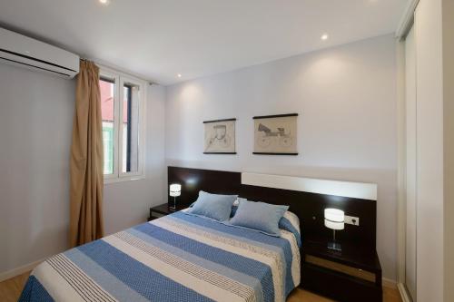 Ένα ή περισσότερα κρεβάτια σε δωμάτιο στο Villa Porto Colom Select