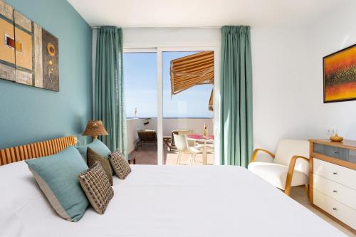 Posteľ alebo postele v izbe v ubytovaní Penthouse Palm Mar