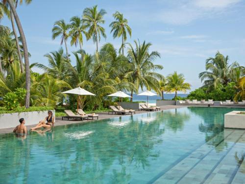 a pool at the resort at Park Hyatt Maldives Hadahaa in Gaafu Alifu Atoll
