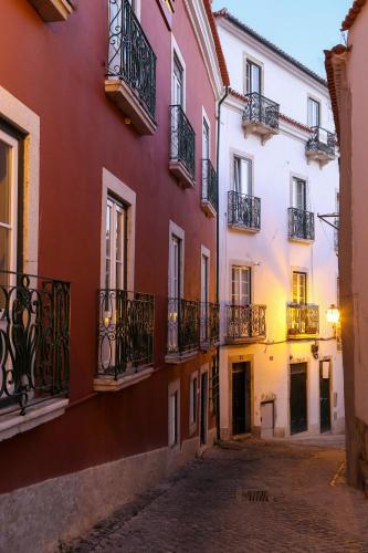 an alley in an old town with buildings at Vincci Alfama in Lisbon