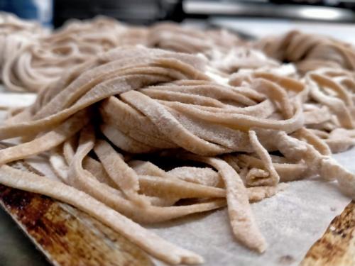 a pile of noodles sitting on top of a table at La Melosa Resort & Spa in Roccastrada