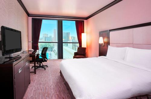 Krevet ili kreveti u jedinici u objektu Holiday Inn Kuwait Al Thuraya City, an IHG Hotel