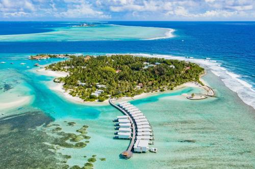 an island in the middle of the ocean with a staircase at Holiday Inn Resort Kandooma Maldives - Kids Stay & Eat Free and Free Roundtrip Speed Boat for a minimum 4 nights stay in Guraidhoo