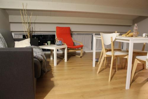 Un lugar para sentarse en Otium casa vacanze-servizio spiaggia incluso a 250 mt-struttura pet friendly