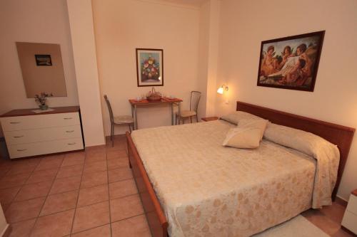 Postel nebo postele na pokoji v ubytování B&B Il Borgodmd