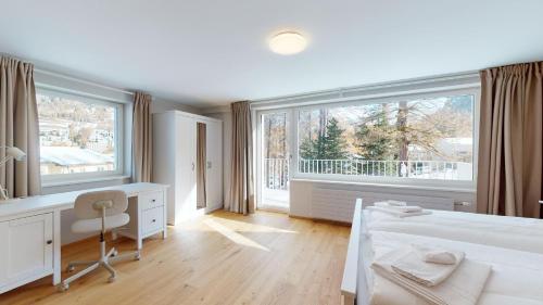 Postel nebo postele na pokoji v ubytování Abitaziun Crasta 1 - Pontresina