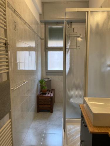 a bathroom with a shower and a sink at CASA BARTOLINI in Bologna