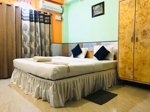 Cama o camas de una habitación en Swarajdeep Vacations