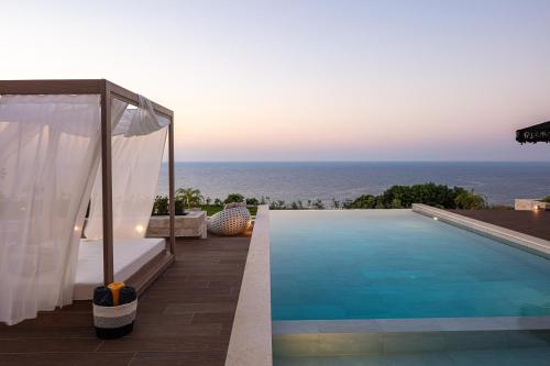 Bazén v ubytování Oneiric Exclusive Villas nebo v jeho okolí
