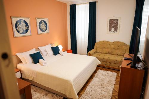 Ліжко або ліжка в номері Rooms Goga