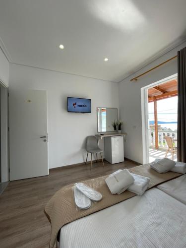 Una cama o camas en una habitación de Relax Mea Hotel