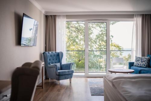 Posezení v ubytování Hotel Szerokie Wody Sea & Sand Ustka