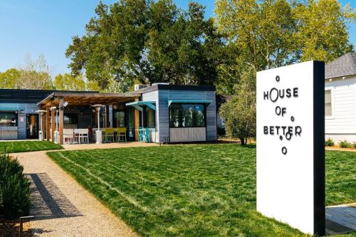 a house of a better sign in front of a house at Dr Wilkinsons Backyard Resort and Mineral Springs a Member of Design Hotels in Calistoga