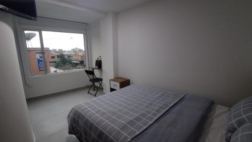 Postel nebo postele na pokoji v ubytování Hotel Andina Blue