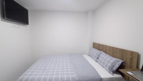 Postel nebo postele na pokoji v ubytování Hotel Andina Blue