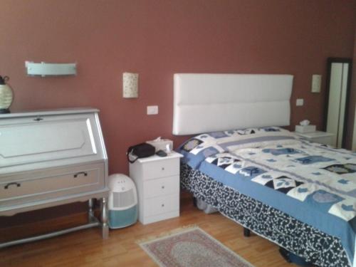 A bed or beds in a room at Tranquilo apartamento Puerto de la Cruz