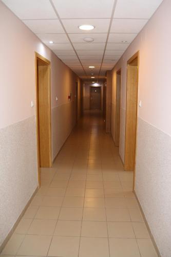 an empty hallway in an office building at Apartman Snesko Zoned in Kopaonik
