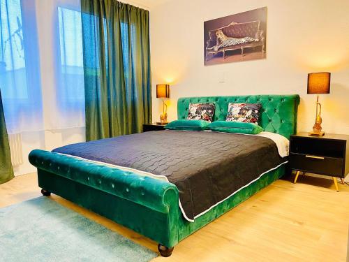 Postel nebo postele na pokoji v ubytování City Center Premium Apartment - Buchs SG