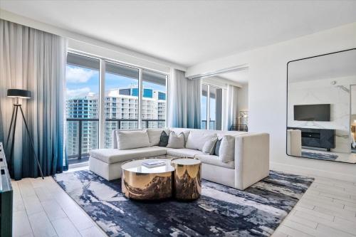 a living room with a couch and a large window at W Residences 2 Bedroom Suite condo in Fort Lauderdale