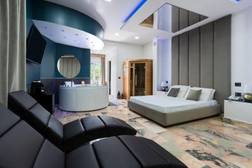 Postel nebo postele na pokoji v ubytování Hotel Ibisco Suites & Relax