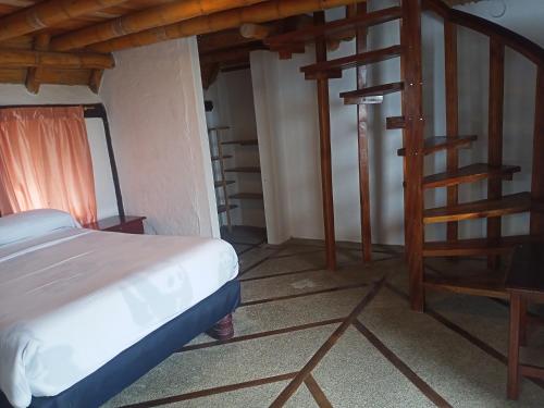 Ein Bett oder Betten in einem Zimmer der Unterkunft Cabañas El Manglar