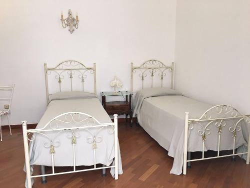 En eller flere senge i et værelse på Il Rifugio Del Conte