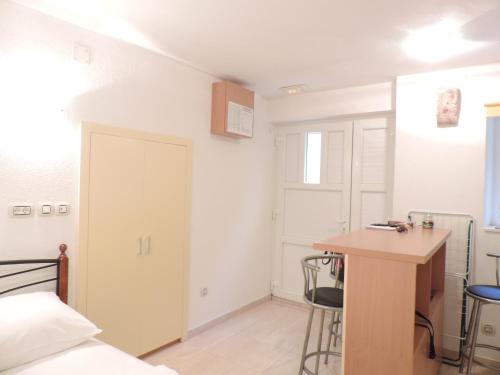 Una cama o camas en una habitación de Studio Josip